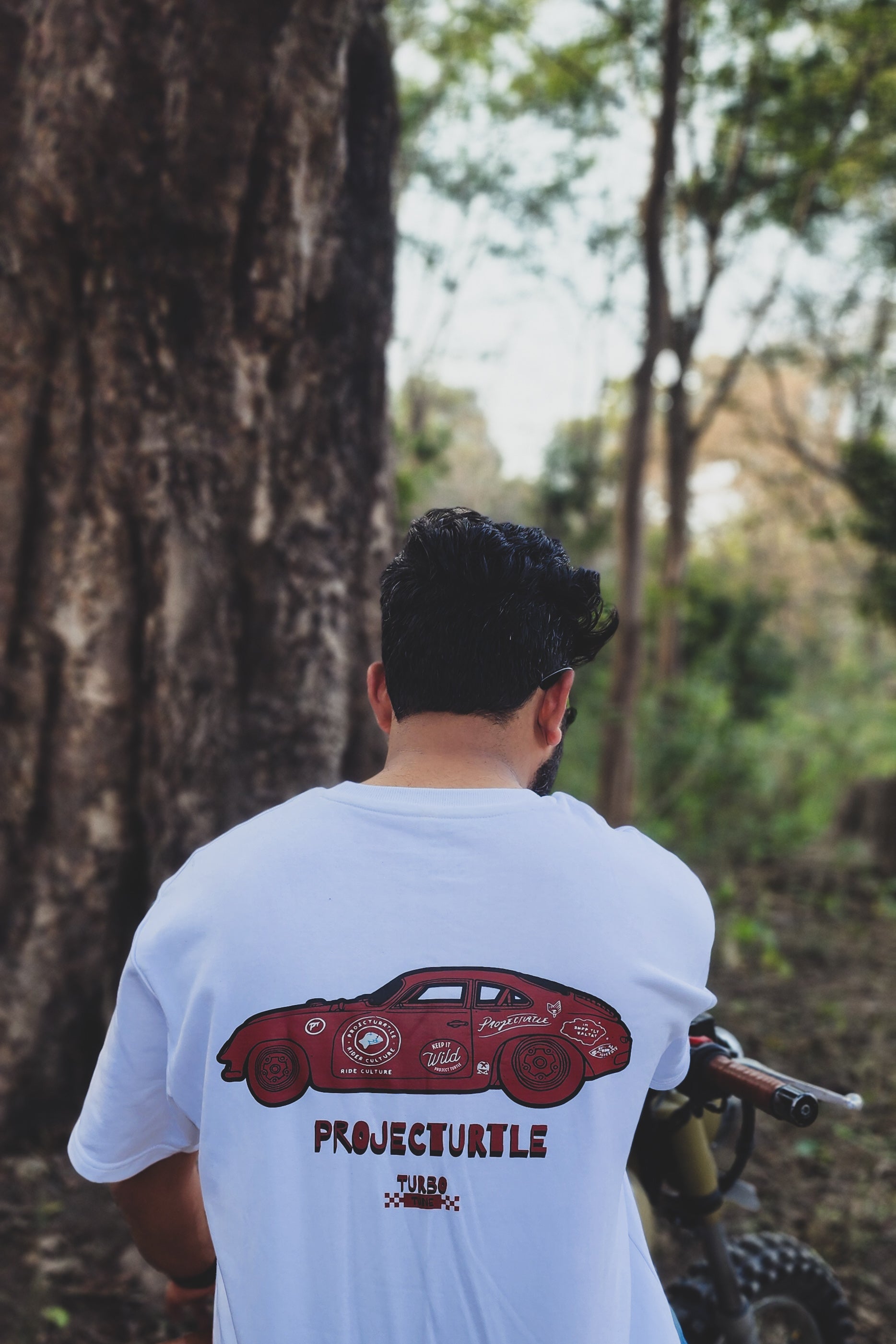 Project Turtle Classic Car Tee white - lifestyle shot on rider