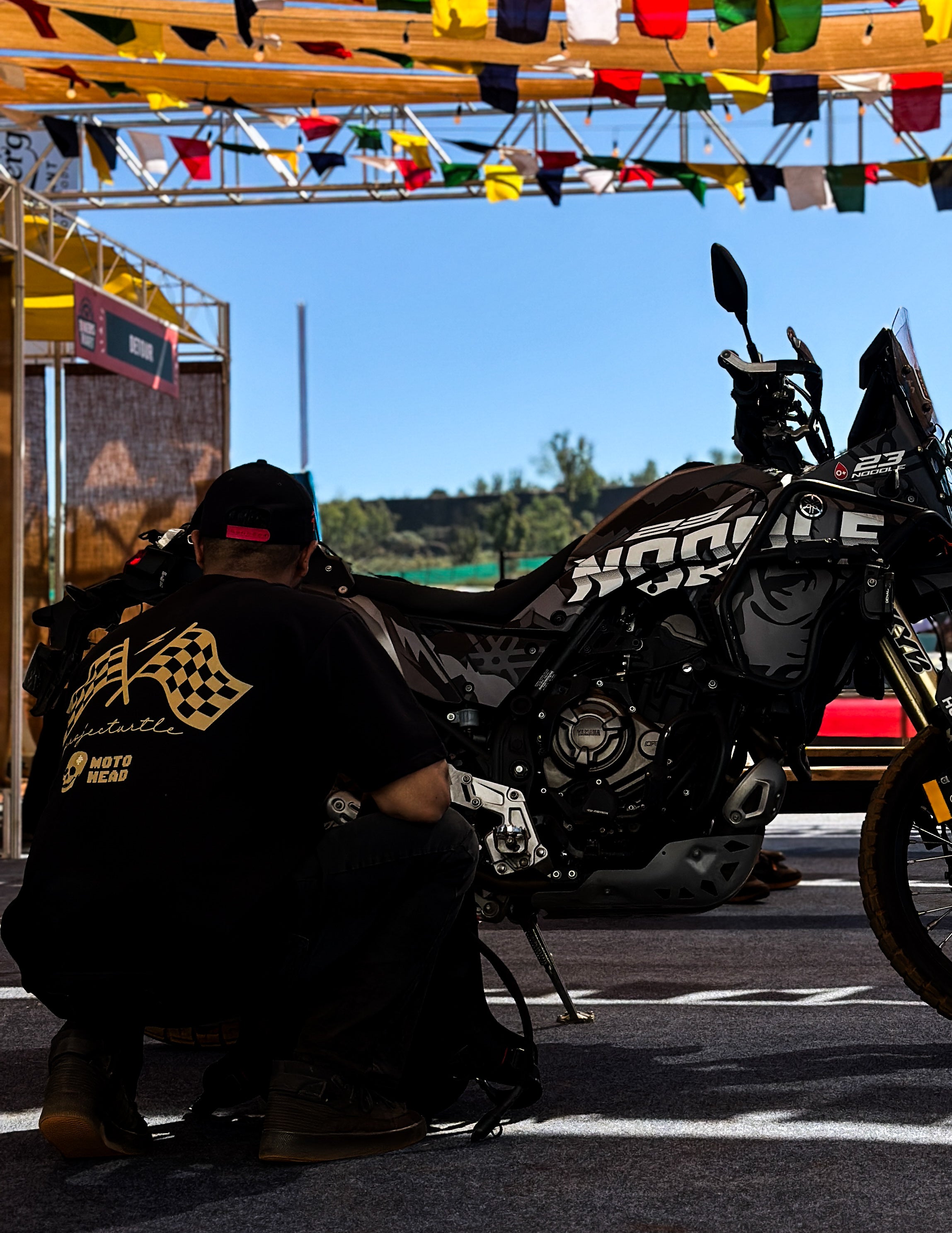 Project Turtle Moto Head Tee - rider wearing tee on motorcycle